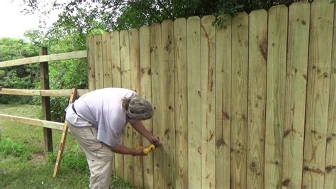 how to install wooden fence